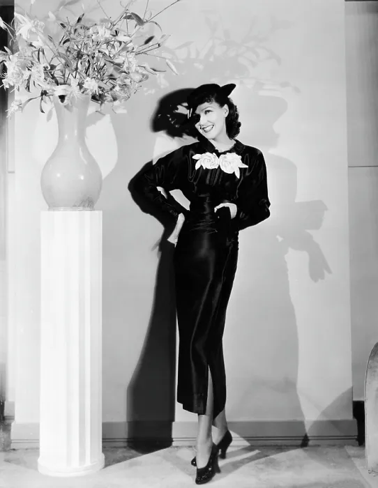 Framed Print : Jean Parker, modeling a collegienne frock of black satin with a split skirt and white satin flowers, ca. mid-1930s Framed Print : Jean Parker, modeling a collegienne frock of black satin with a split skirt and white satin flowers, ca. mid-1930s