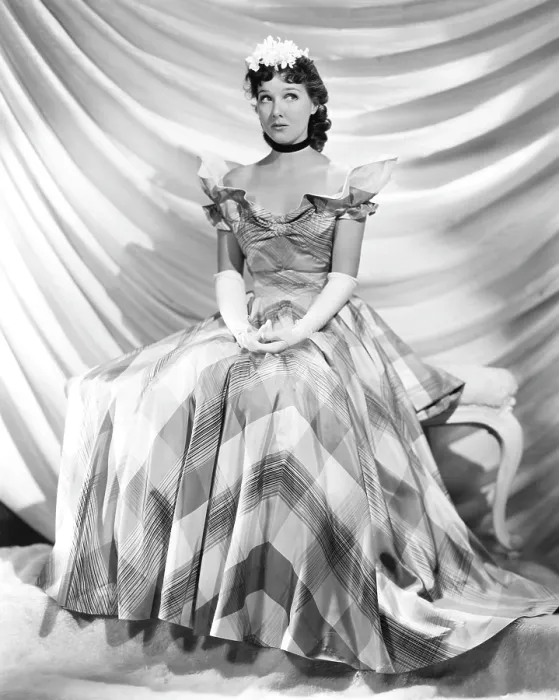 Framed Print : Jean Parker, modeling a taffeta frock by Adrian, in brown and ivory plaid, 1937
