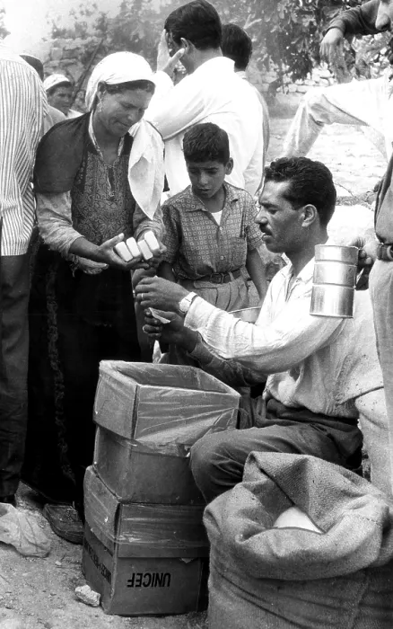 Framed Print : JERUSALEM: Soap is given to refugees at a distribution point set up for UNICEF supplies sent to relieve destitute families in Jordan Framed Print : JERUSALEM: Soap is given to refugees at a distribution point set up for UNICEF supplies sent to relieve destitute families in Jordan
