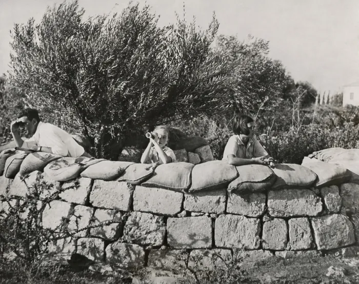 Framed Print : Jews guard their settlement in Palestine. A man and two children watch for trouble from behind stone wall of a Jewish colony. Sept. 15, 1937. (BSLOC_2013_9_205)
