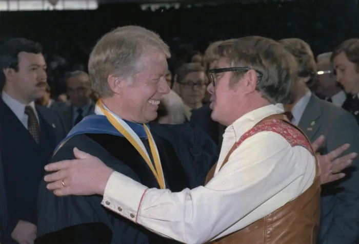 Framed Print : Jimmy Carter greets his brother Billy Carter at the commencement ceremonies at Georgia Institute of Technology in Atlanta Georgia