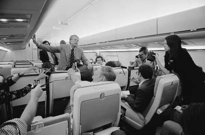 Framed Print : Jimmy Carter holding an informal press conference aboard his plane on a campaign trip. Sept. 11 1976 Framed Print : Jimmy Carter holding an informal press conference aboard his plane on a campaign trip. Sept. 11 1976