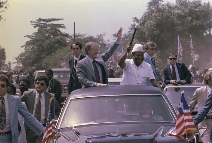 Framed Print : Jimmy Carter and President William Tobert 1813-1980 of Liberia wave from their motorcade during the President's visit to Monrovia Liberia