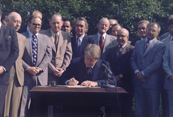 Framed Print : Jimmy Carter signs Youth Employment Bill into law on August 5 1977 Framed Print : Jimmy Carter signs Youth Employment Bill into law on August 5 1977