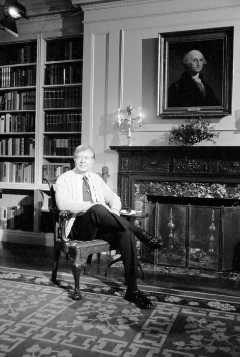 Framed Print : Jimmy Carter sports a cardigan in the White House library during a televised fireside chat (Address to the Nation on Energy). April 18, 1977