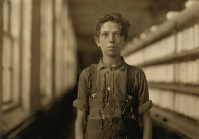 Framed Print : Jo Bodeon, a child laborer in the Chace Cotton Mill of Burlington, Vermont worked in the spinning mule room. May 1909 photo by Lewis Hine Framed Print : Jo Bodeon, a child laborer in the Chace Cotton Mill of Burlington, Vermont worked in the spinning mule room. May 1909 photo by Lewis Hine