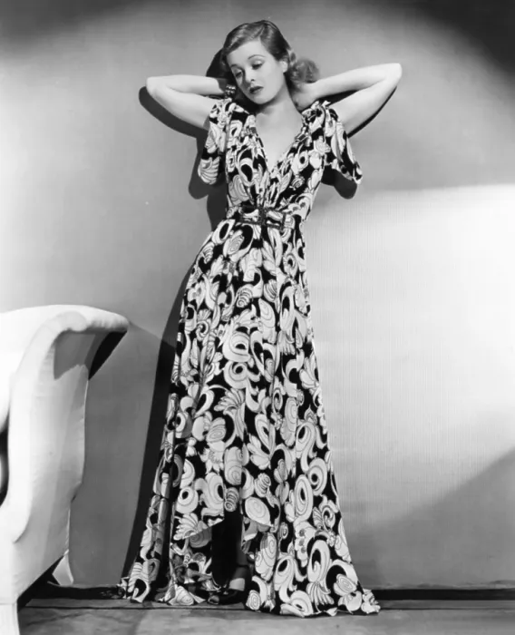 Framed Print : Joan Bennett in scroll motif dinner dress from I. Magnin, 1938