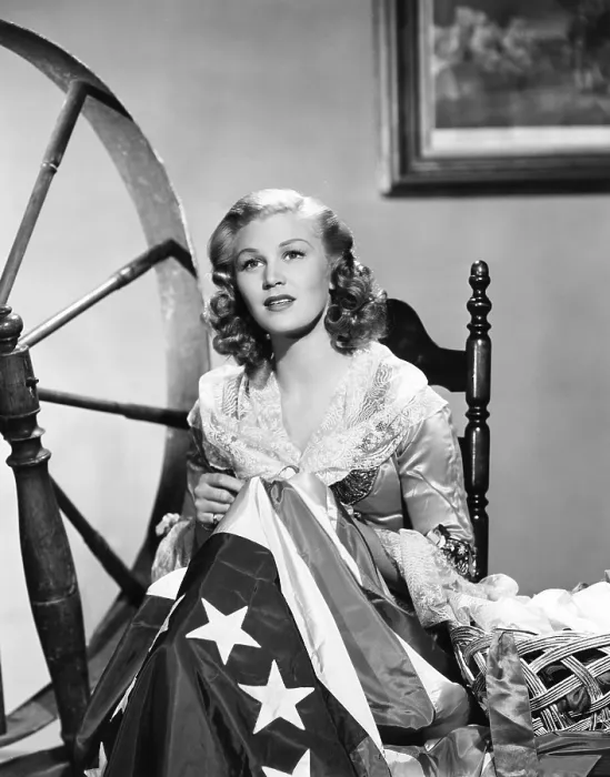 Framed Print : Joan Caulfield as Betsy Ross, sewing the American flag, in celebration of the Fourth of July, Paramount portrait by Bud Fraker, 1947