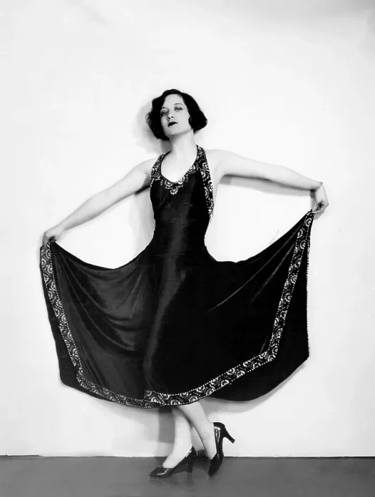 Framed Print : Joan Crawford, in a black satin gown trimmed with silver beads, ca. 1926 Framed Print : Joan Crawford, in a black satin gown trimmed with silver beads, ca. 1926