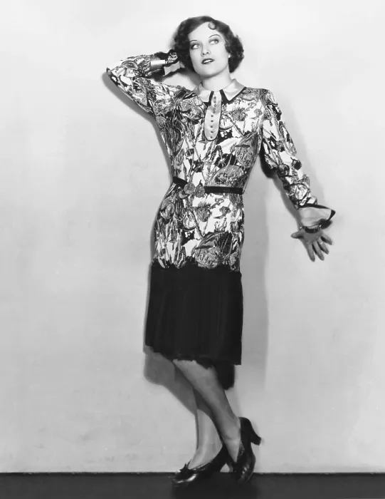 Framed Print : Joan Crawford, in a Ruth Harriet Louise portrait, wearing a hand-painted futuristic blouse and navy crepe skirt, 1928 Framed Print : Joan Crawford, in a Ruth Harriet Louise portrait, wearing a hand-painted futuristic blouse and navy crepe skirt, 1928