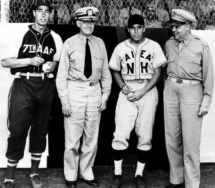 Framed Print : Joe DiMaggio and Harold Pee Wee Reese sign baseballs for Vice Admiral Robert L. Ghormley and Brigadier General William J. Flood. DiMaggio played for the Army team, 1944