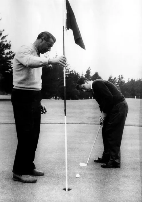 Framed Print : Joe DiMaggio and his son, Joe Jr. play golf in San Francisco, 1956. Courtesy: CSU Archives / Everett Collection