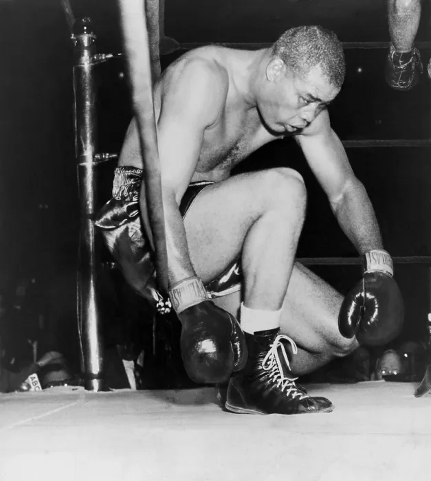 Framed Print : Joe Louis last professional boxing fight. He sinks through the ropes in an eighth-round knockout by Rocky Marciano in Madison Square Garden. Oct. 27, 1951