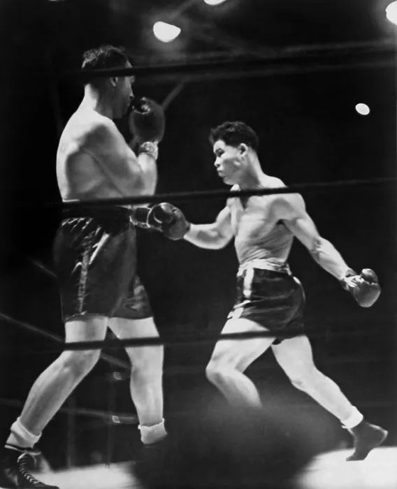 Framed Print : Joe Louis (right) in boxing match with Jack Sharkey at Yankee Stadium, New York. August 18, 1936. Louis won with a knockout in the third round. (BSLOC_2013_9_30)