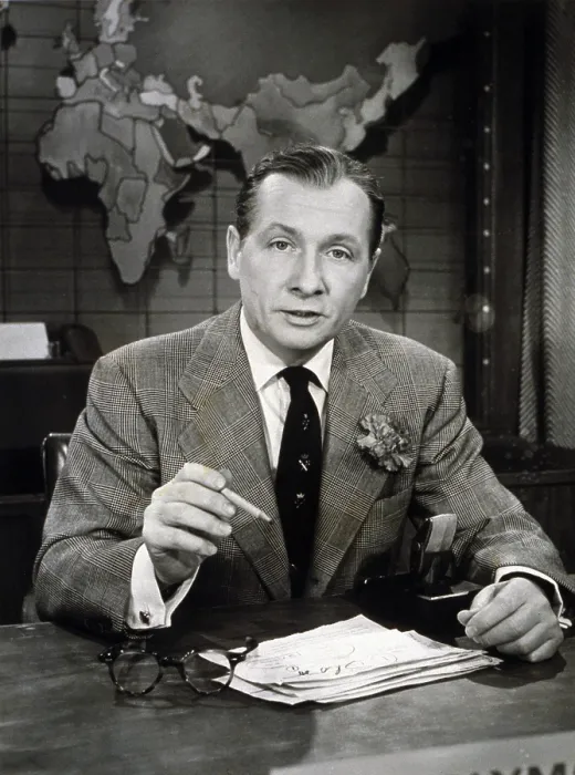 Framed Print : John Cameron Swayze (1906-1966), at news anchor desk, used his acting experience to visually enliven news reporting for television. 1955