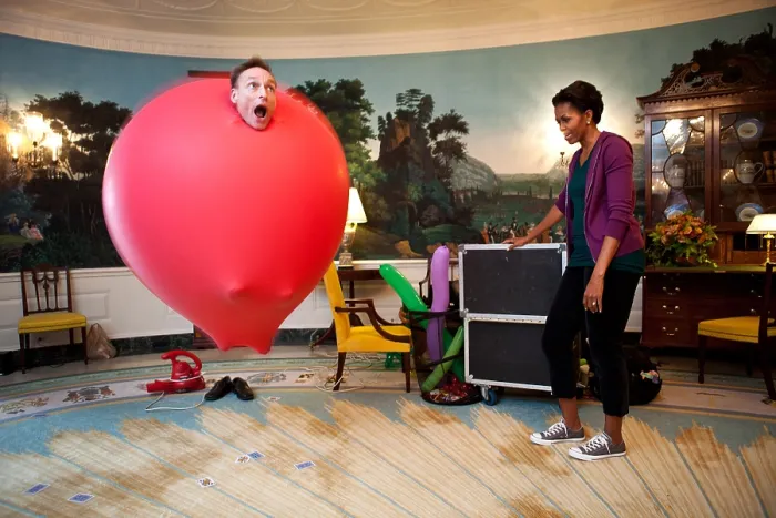Framed Print : John Cassidy in a six-foot red balloon in the Diplomatic Reception Room with Michelle Obama. White House, Oct. 11, 2011. (BSLOC_2015_13_187) Framed Print : John Cassidy in a six-foot red balloon in the Diplomatic Reception Room with Michelle Obama. White House, Oct. 11, 2011. (BSLOC_2015_13_187)