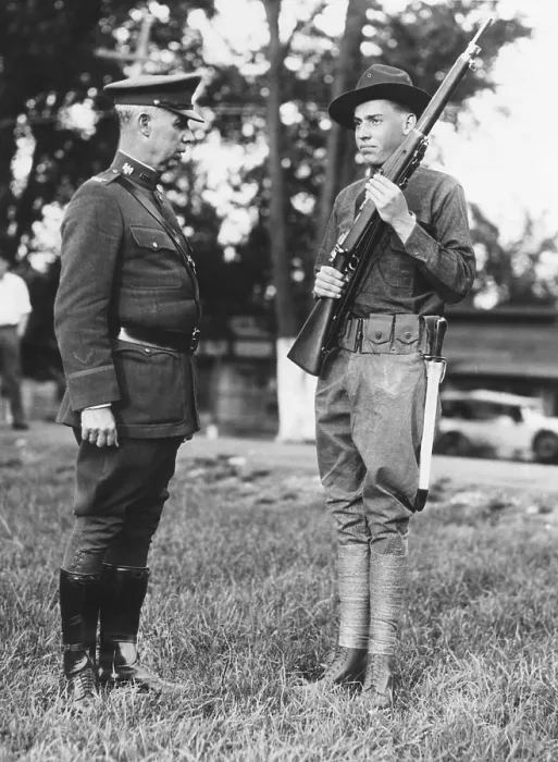 Framed Print : John Coolidge, son of Pres. Coolidge, presenting arms to General Malvern Hill Burnum. He was at the Citizens Military Training Camp, Camp Devens, Ayer, Massachusetts. Sept