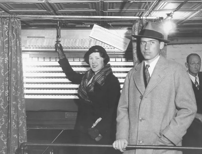 Framed Print : John Coolidge and his wife Florence Trumbull Coolidge voted in New Haven, CT. Nov. 8, 1932. Florence's father, a conservative Republican, was running for Governor