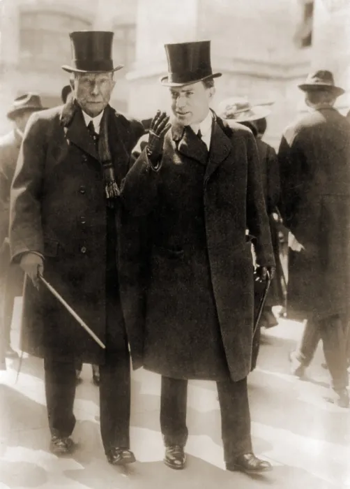 Framed Print : John D. Rockefeller Sr. founder of Standard Oil and then richest man in the world, walking on street with his son, John D. Rockefeller, Jr. Ca. 1915