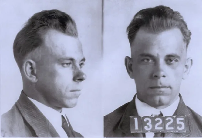 Framed Print : John Dillinger (1903-1934), in mugshot probably made during his eight and half year term in Indiana State Prison