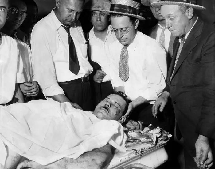 Framed Print : John Dillinger, Public Enemy No.1, lying on a slab in the county morgue in Chicago Framed Print : John Dillinger, Public Enemy No.1, lying on a slab in the county morgue in Chicago