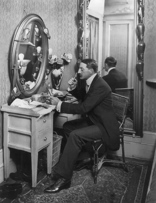 Framed Print : John Drew (1853-1927), American actor, seated at dressing table, in Empire Theatre, New York, 1902