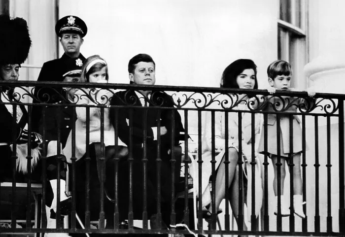 Framed Print : John F. Kennedy Jr. gets a closer look at the famed Black Watch (Royal Highland Regiment) Pipe and Drum Corps