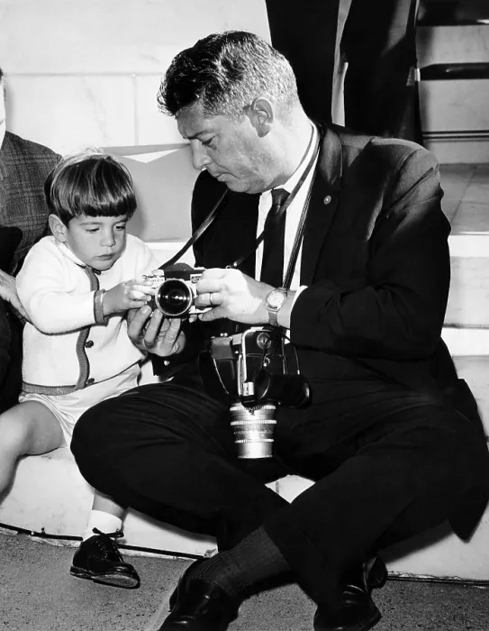 Framed Print : John F. Kennedy Jr. takes an interest in the cameras of White House photographer Capt. Cecil Stoughton. Nov. 11, 1963. (CSU_ALPHA_902) CSU Archives / Everett Collection