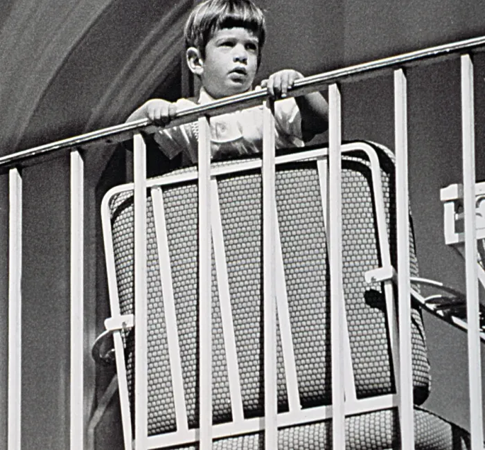 Framed Print : JOHN F. KENNEDY Jr. watches a ceremony from a balcony at the White House, 1963. Courtesy: CSU Archives  /  Everett Collection
