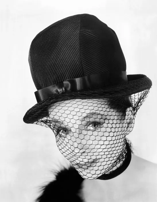 Framed Print : John Frederics hat from the early 1960s. It has an exaggerated bowler shape feminized by a netted veil secured by a black neck band Framed Print : John Frederics hat from the early 1960s. It has an exaggerated bowler shape feminized by a netted veil secured by a black neck band