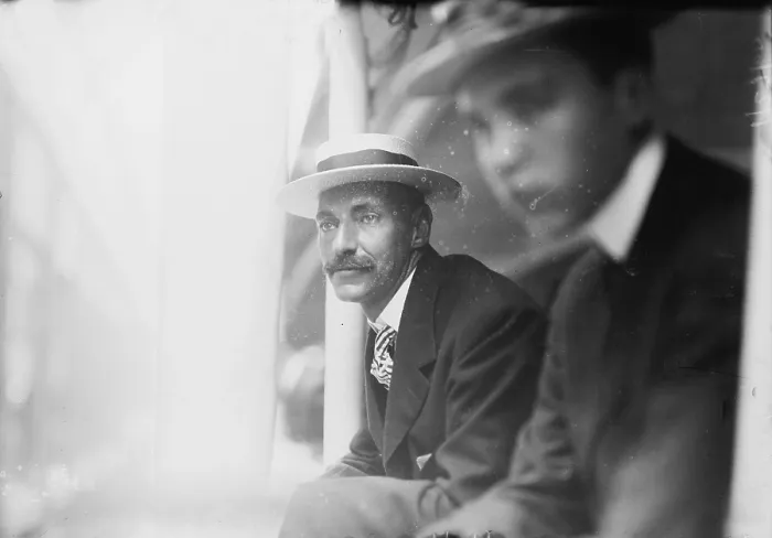 Framed Print : John Jacob Astor IV (left), leaning from a train window, circa 1909 Framed Print : John Jacob Astor IV (left), leaning from a train window, circa 1909