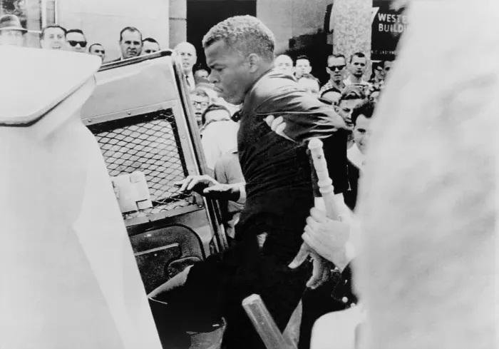Framed Print : John Lewis being ushered into a police patrol wagon during a demonstration in Nashville, Tennessee. April 29, 1964 Framed Print : John Lewis being ushered into a police patrol wagon during a demonstration in Nashville, Tennessee. April 29, 1964
