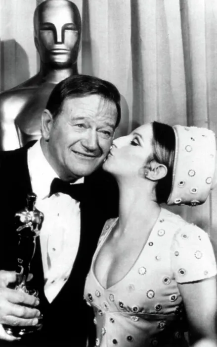 Framed Print : John Wayne congratulated by Barbra Streisand for winning Academy Award for TRUE GRIT, 4 / 7 / 70. Courtesy: CSU Archives  /  Everett Collection