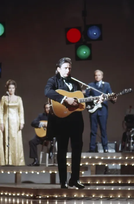 Framed Print : THE JOHNNY CASH SHOW, From left: June Carter Cash, Johnny Cash onstage, (Season 1, ep. 127, aired April 8, 1970), 1969-1971