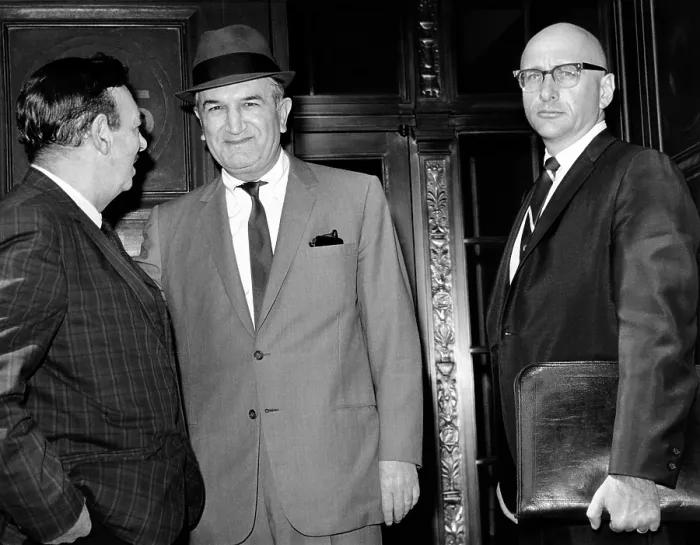 Framed Print : Joseph (Joe Bananas) Bonanno (center) talks to UPI reporter Robert Evans on steps of Federal Courthouse. Bonanno is accompanied by his attorney, Albert J. Krieger. May 17, 1966
