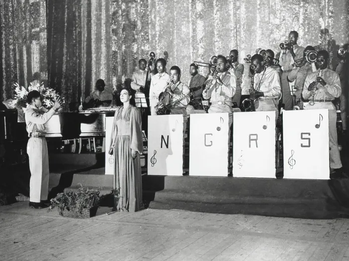 Framed Print : Josephine Baker, sings in the Municipal Theater, Oran, Algeria, North Africa. She is accompanied by a uniformed Army orchestra of African Americans. (BSLOC_2013_14_253) Framed Print : Josephine Baker, sings in the Municipal Theater, Oran, Algeria, North Africa. She is accompanied by a uniformed Army orchestra of African Americans. (BSLOC_2013_14_253)