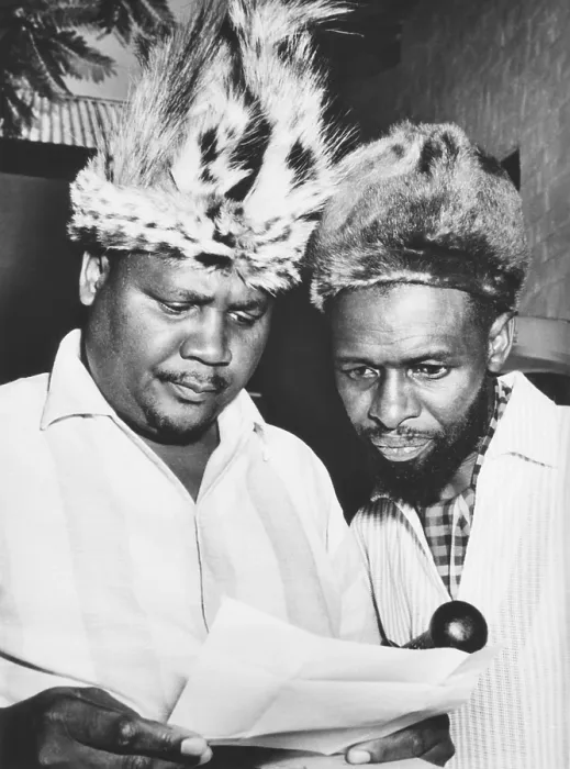 Framed Print : Joshua Nkomo reading a Rhodesian criminal charge against him in April 1963. In 1962 Nkomo founded the Zimbabwe African People's Union (ZAPU)