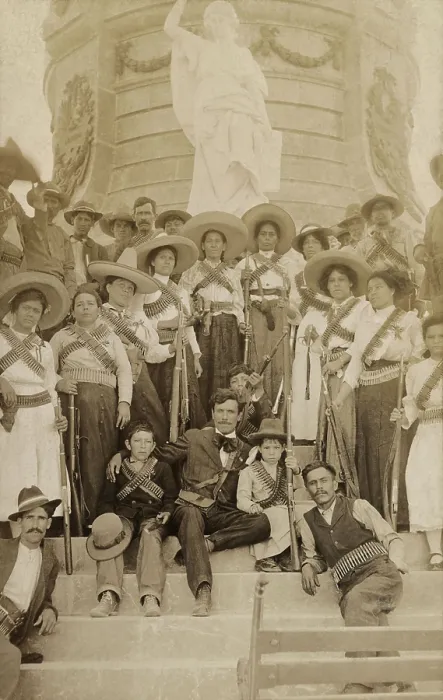 Framed Print : Journalist Lazaro Gutirrez de Lara surrounded by women Mexican revolutionary soldiers. They pose on the base of the Benito Juarez monument in Juarez, Mexico, c
