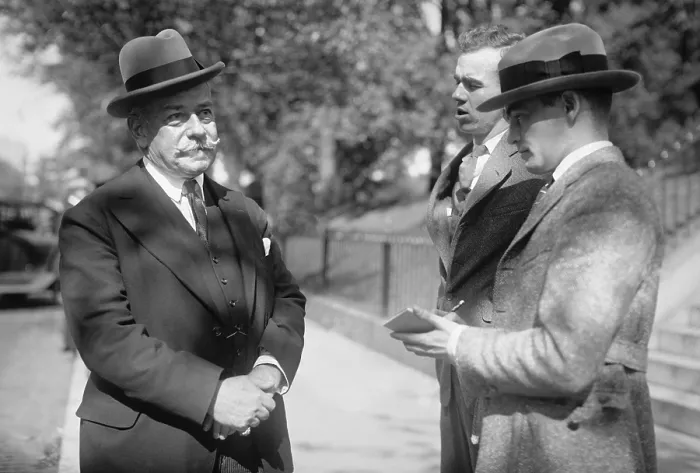 Framed Print : Jules Bache 1861-1944 a German-American stockbroker and banker being interviewed by reporters in Washington D.C. Oct. 22 1922. (BSLOC_2010_18_117)