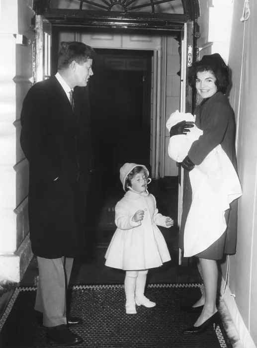 Framed Print : Kennedy Family Returns from Palm Beach, Florida on Feb. 4, 1961. President John Kennedy; Caroline Kennedy; Jacqueline Kennedy holding John Kennedy, Jr Framed Print : Kennedy Family Returns from Palm Beach, Florida on Feb. 4, 1961. President John Kennedy; Caroline Kennedy; Jacqueline Kennedy holding John Kennedy, Jr