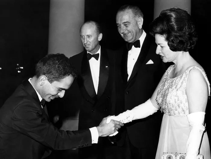 Framed Print : King Hussein of Jordan bows as he is greeted at the White House by Augier Biddle Duke, President Lyndon B.Johnson, and his wife Lady Bird Johnson. April 1964