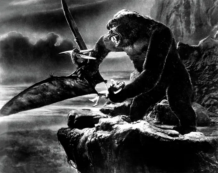 Framed Print : KING KONG, 1933, holding Fay Wray and fighting giant flying lizard