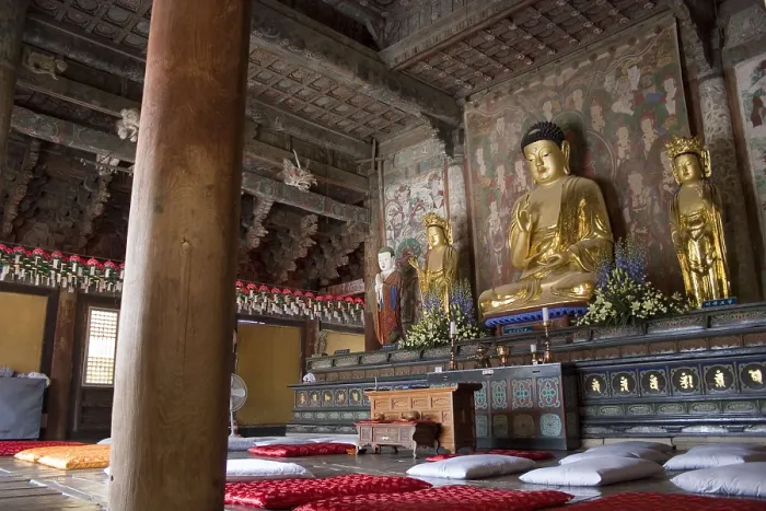 Framed Print : KOREA. Seokguram Grotto. Pulguksa Temple. The Three Buddhas, present (middle), past (left) and future (right) inside the main temple. On the floor, cushions for the monks Framed Print : KOREA. Seokguram Grotto. Pulguksa Temple. The Three Buddhas, present (middle), past (left) and future (right) inside the main temple. On the floor, cushions for the monks