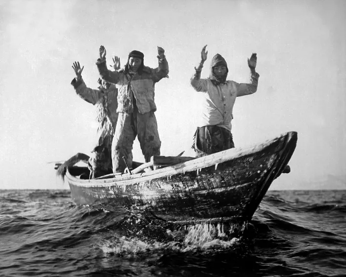 Framed Print : Three Korean Communists in a fishing boat are captured by the USS MANCHESTER off the coast of Korea. May 10, 1951. Korean War, 1950-53. (BSLOC_2014_11_168)