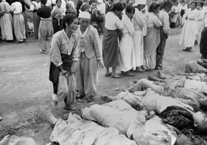 Framed Print : Koreans from Hamhung identify bodies of political prisoners killed by the North Korean Army