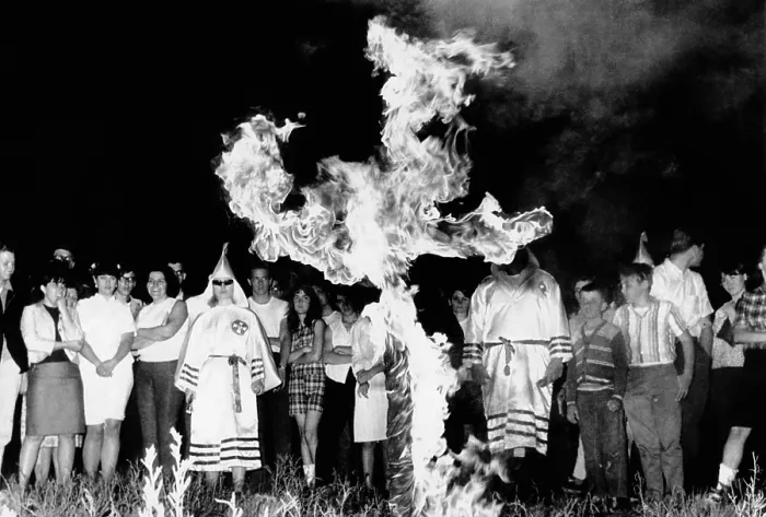 Framed Print : Ku Klux Klan cross burning ceremony, Upper Marlboro, Maryland. Seven members of the group, dressed in their robes, paraded about the cross for than 150 spectators. May 13, 1966
