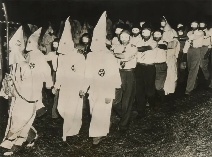 Framed Print : Ku Klux Klan initiation at Stone Mountain near Atlanta, Georgia. June 1949. KKK men in full white masks and gowns lead new members wearing small face masks. - (BSLOC_2015_1_208) Framed Print : Ku Klux Klan initiation at Stone Mountain near Atlanta, Georgia. June 1949. KKK men in full white masks and gowns lead new members wearing small face masks. - (BSLOC_2015_1_208)