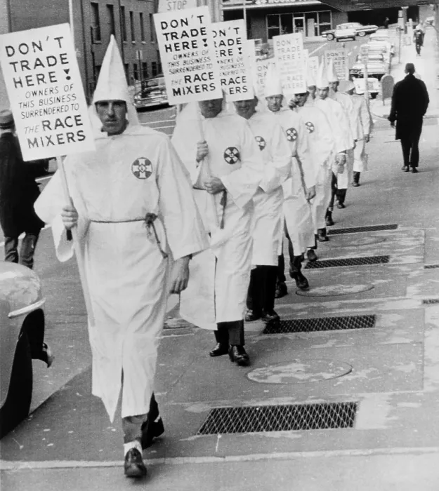 Framed Print : Ku Klux Klansmen picket newly desegregated hotel in Albany, Georgia. KKK was a militant minority intimidated moderates to resist racial integration of public facilities. Jan Framed Print : Ku Klux Klansmen picket newly desegregated hotel in Albany, Georgia. KKK was a militant minority intimidated moderates to resist racial integration of public facilities. Jan