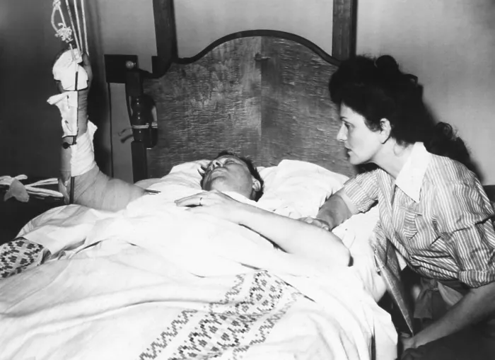 Framed Print : Labor Leader Walter Reuther in hospital after an attempted assassination. His wife, May Reuther, was at his hospital bedside. April 21, 1948 Framed Print : Labor Leader Walter Reuther in hospital after an attempted assassination. His wife, May Reuther, was at his hospital bedside. April 21, 1948