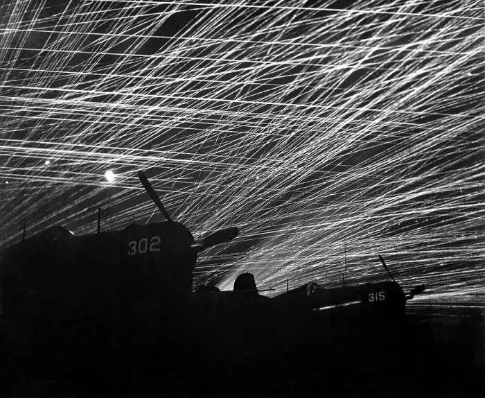 Framed Print : A lacework of anti-aircraft fire by the Marine defenders of Yontan airfield, on Okinawa. Firing is at Japanese night air raiders Framed Print : A lacework of anti-aircraft fire by the Marine defenders of Yontan airfield, on Okinawa. Firing is at Japanese night air raiders